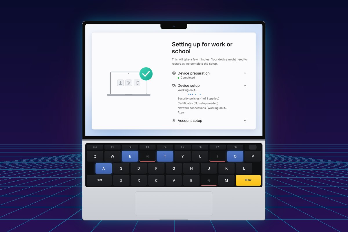 Intune Hangman game on a laptop showing the Enrollment Status Page